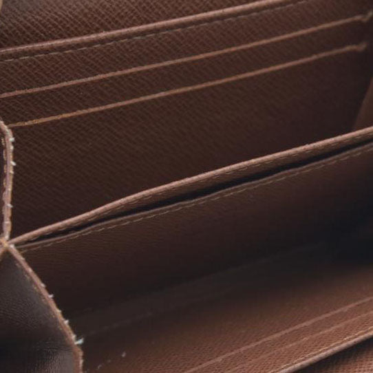 Louis Vuitton  Monogram Zippy Coin Purse $545