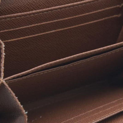 Louis Vuitton  Monogram Zippy Coin Purse $545