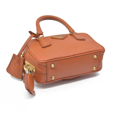 $750 Prada Saffiano Lux Mini Crossbody Bag