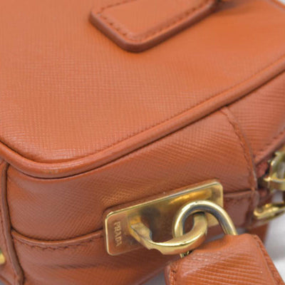 $750 Prada Saffiano Lux Mini Crossbody Bag