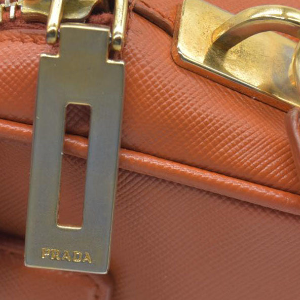 $750 Prada Saffiano Lux Mini Crossbody Bag