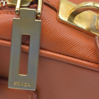 $750 Prada Saffiano Lux Mini Crossbody Bag