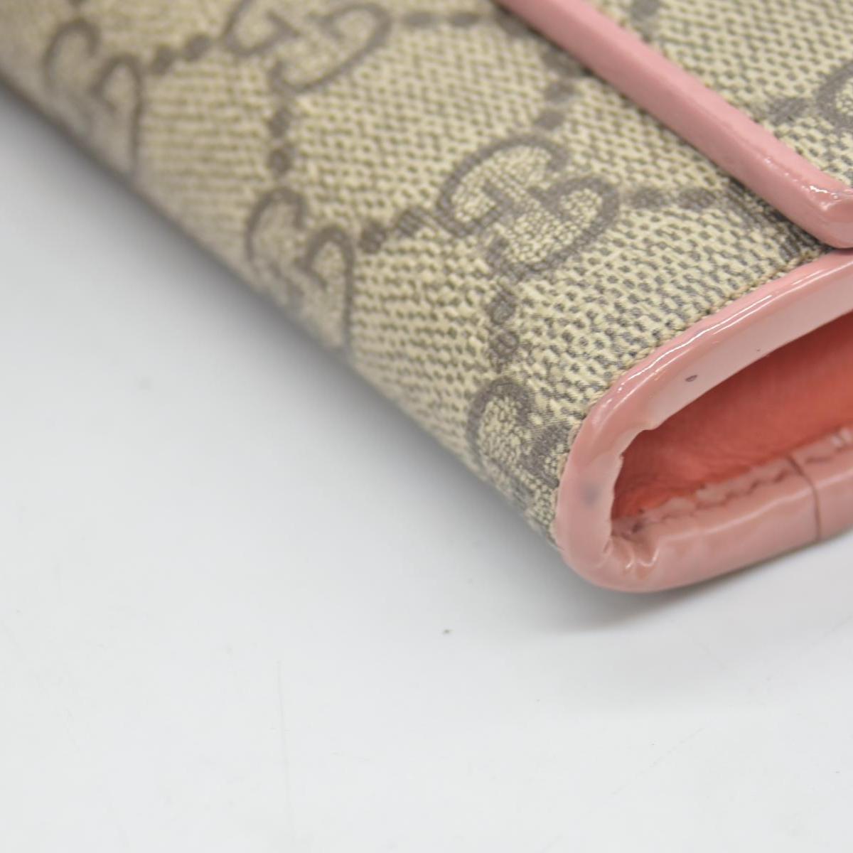 $650 Gucci pink original gg canvas continental bow wallet
