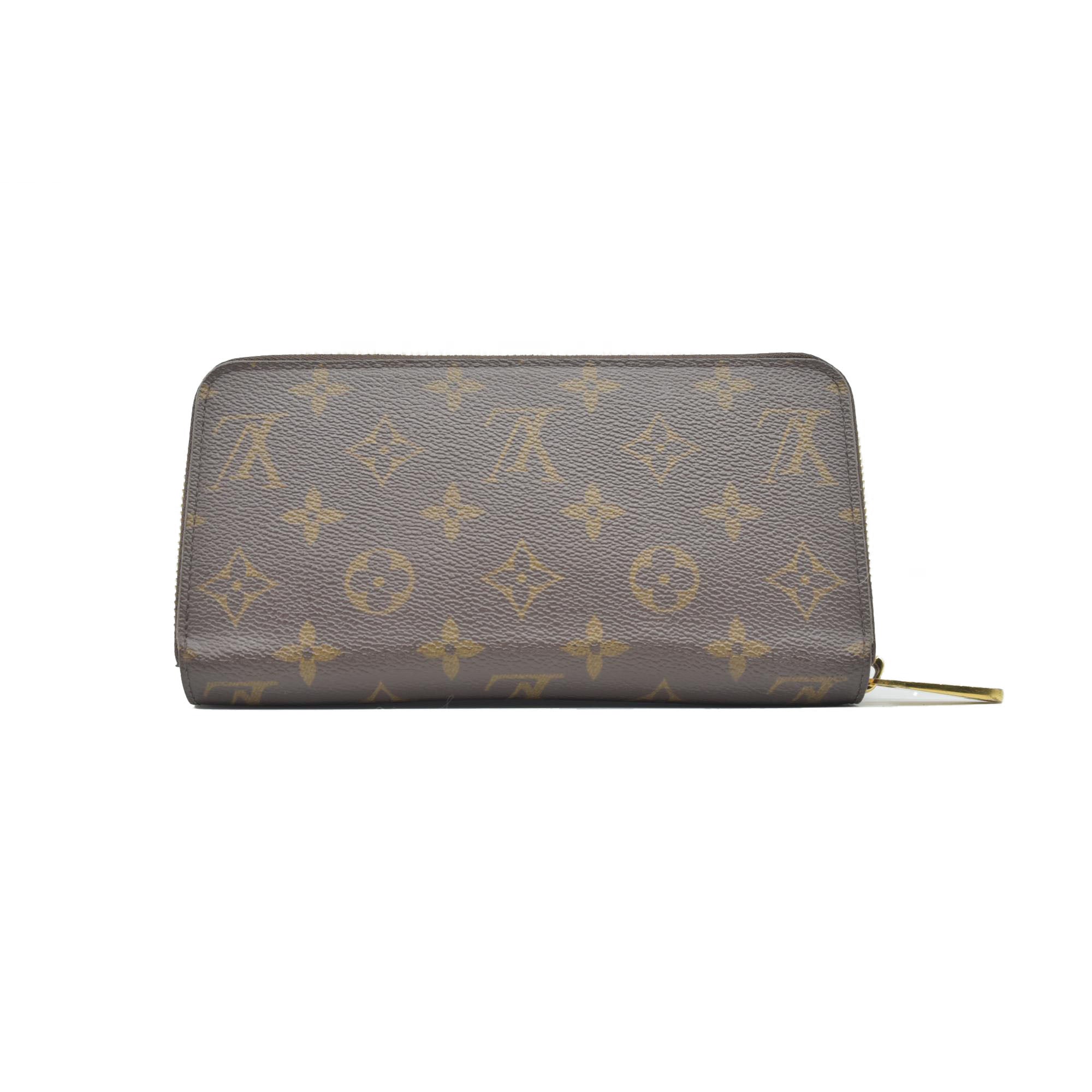 $915 LM0280 2020 Louis Vuitton Monogram Zippy Wallet Fuchsia