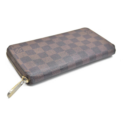AUCTION $915 Louis Vuitton Damier Ebene Zippy Wallet