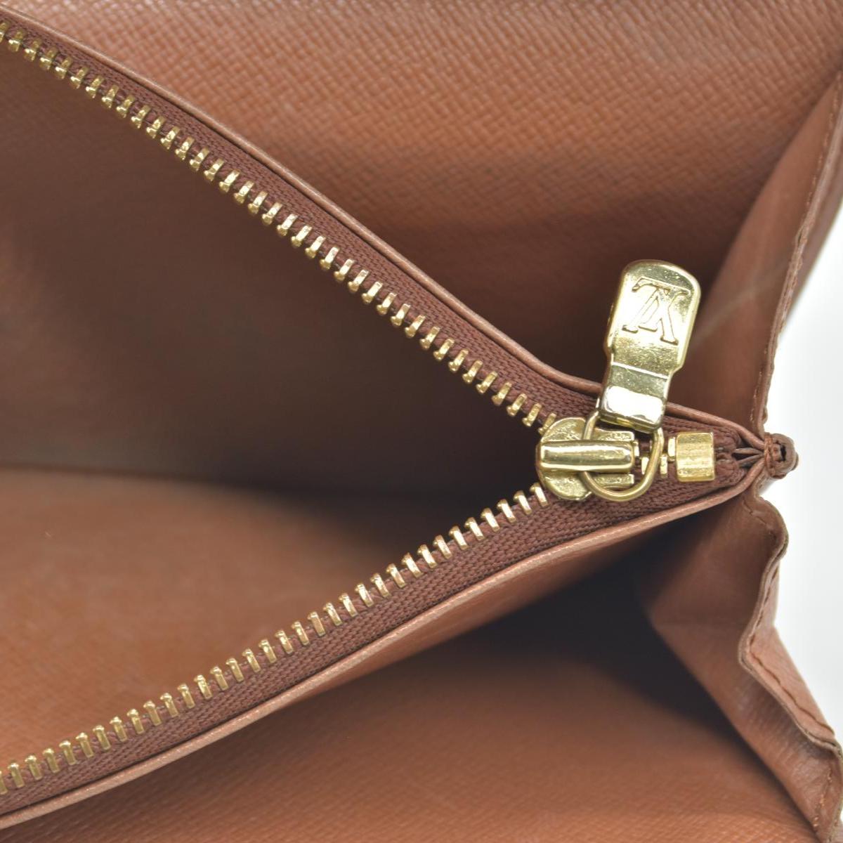 $725 Louis Vuitton Monogram Porte Tresor International Wallet CONSIGNMENT CA0937