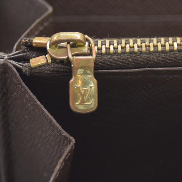 AUCTION $915 Louis Vuitton Damier Ebene Zippy Wallet