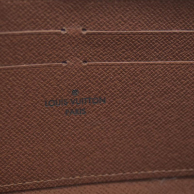 AUCTION $915 Louis Vuitton Monogram Zippy Wallet
