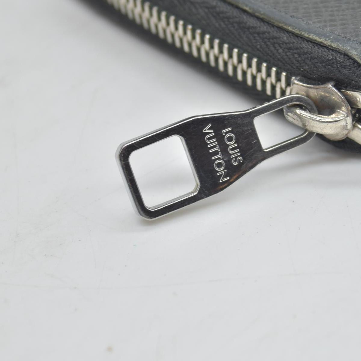 LOUIS VUITTON Zippy Wallet Vertical Purse black Taiga CONSIGNMENT