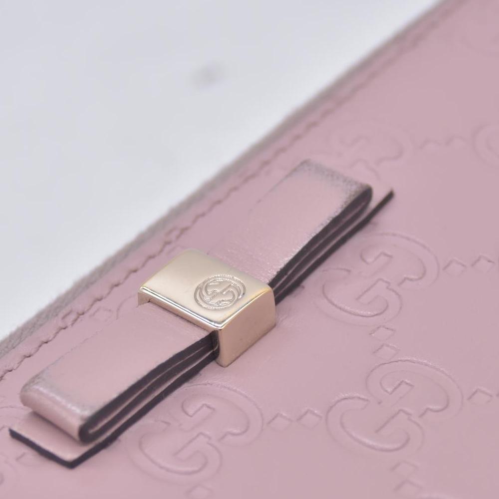 $730 Gucci Guccissima Bow Zip Around Wallet CONSIGNMENT 10021229