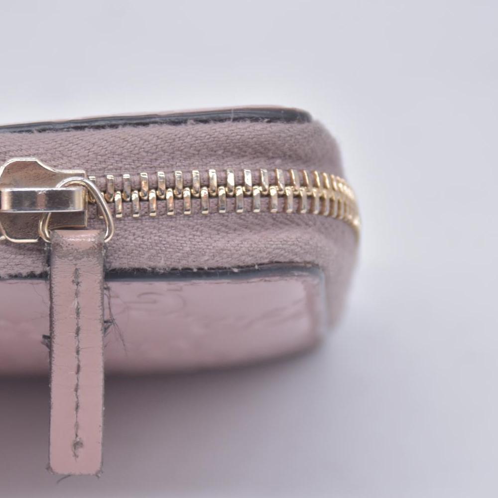 $730 Gucci Guccissima Bow Zip Around Wallet CONSIGNMENT 10021229