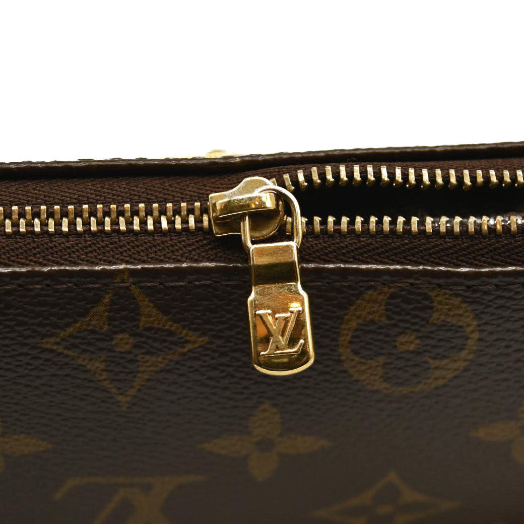 LOUIS VUITTON Monogram Eva Clutch