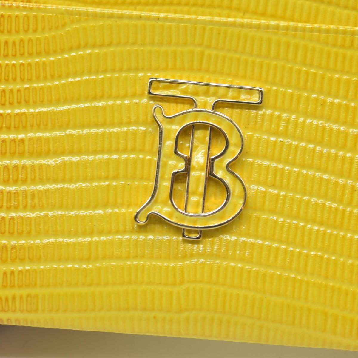 Burberry embossed leather tb card case Yellow CONSIGNMENT