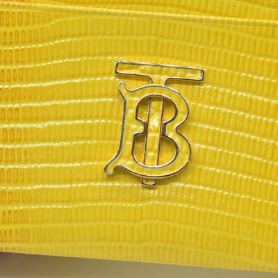 Burberry embossed leather tb card case Yellow CONSIGNMENT