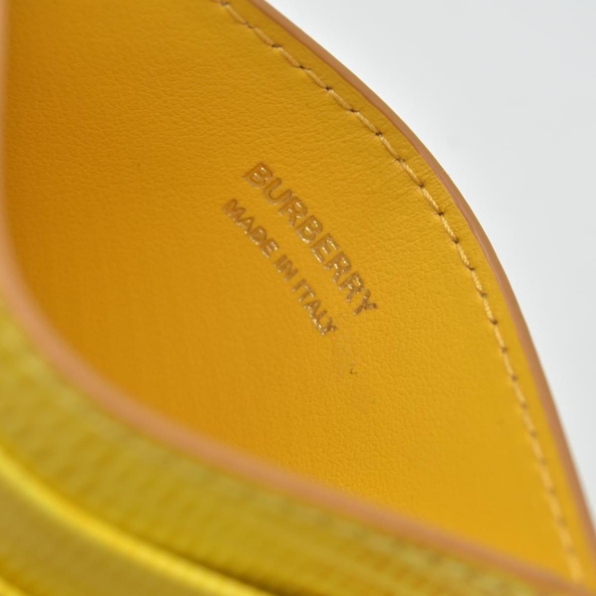 Burberry embossed leather tb card case Yellow CONSIGNMENT