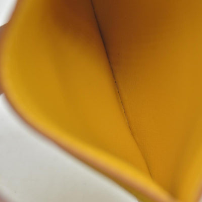 Burberry embossed leather tb card case Yellow CONSIGNMENT