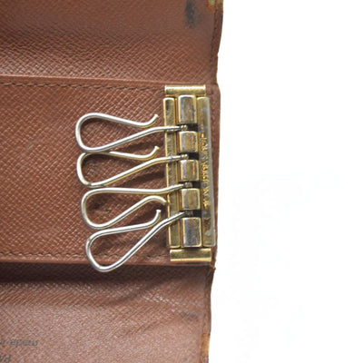 AUCTION $295 Louis Vuitton Monogram Multiples 4 Ring Key Holder