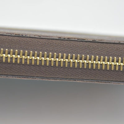 $915 Louis Vuitton Monogram 2015 Christmas Animation Zippy Wallet Hibiscus CONSIGNMENT