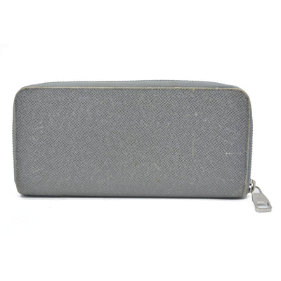 AUCTION $985 Louis Vuitton  Taiga Zippy Organizer Wallet Glacier