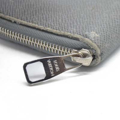 AUCTION $985 Louis Vuitton  Taiga Zippy Organizer Wallet Glacier
