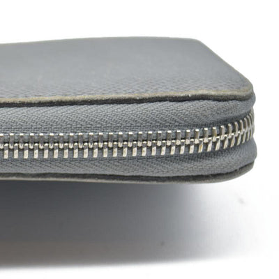 AUCTION $985 Louis Vuitton  Taiga Zippy Organizer Wallet Glacier