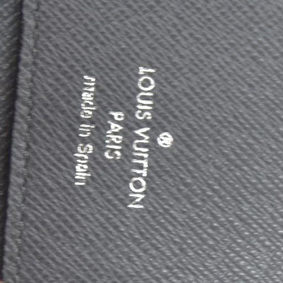 AUCTION $985 Louis Vuitton  Taiga Zippy Organizer Wallet Glacier