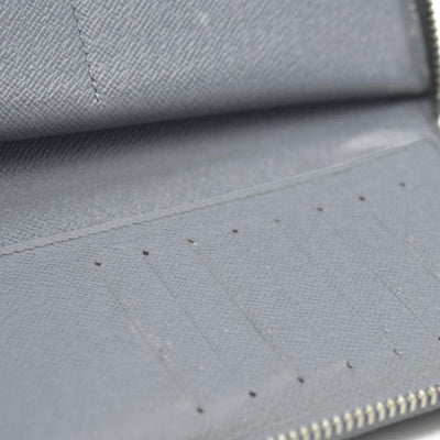 AUCTION $985 Louis Vuitton  Taiga Zippy Organizer Wallet Glacier