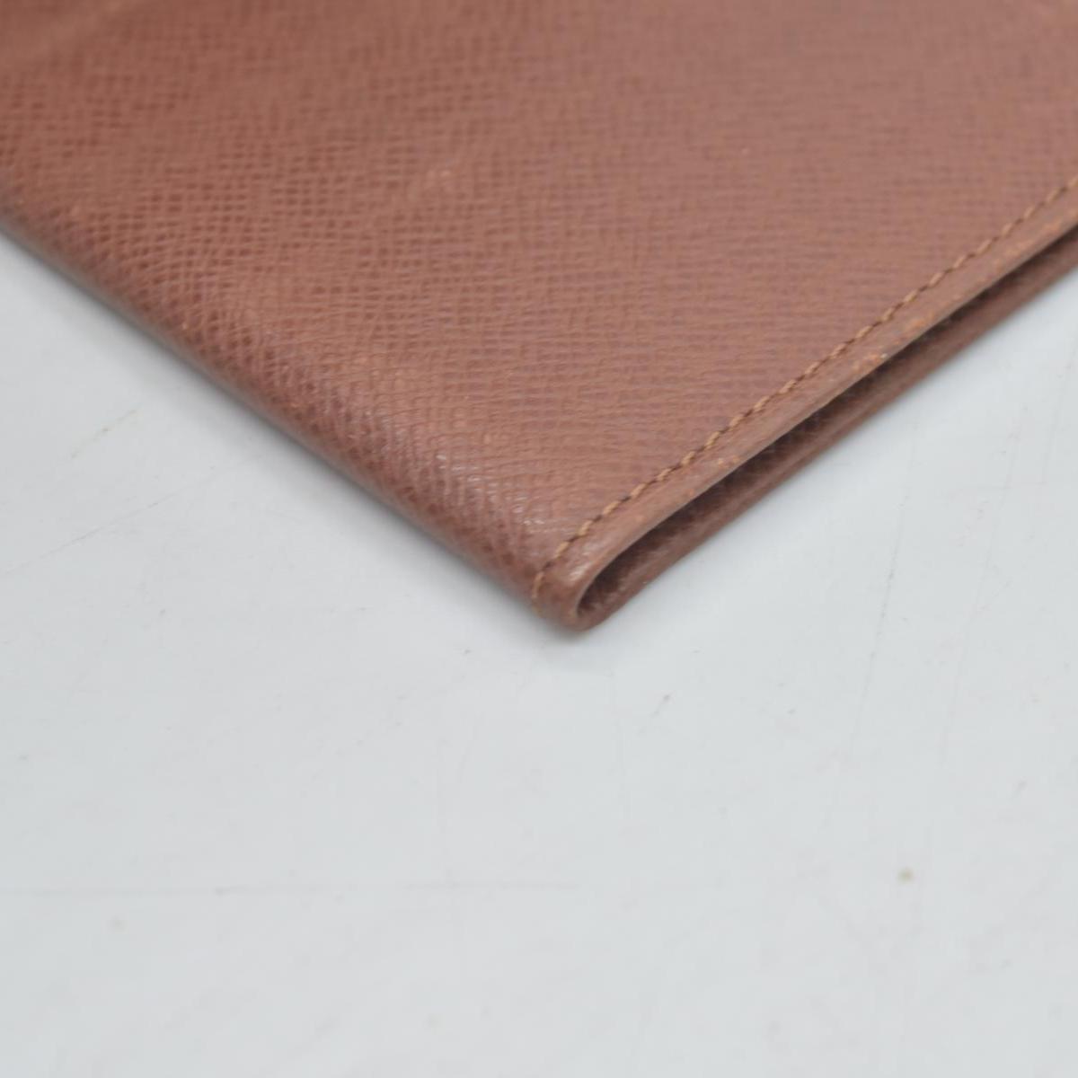 $435 Louis Vuitton Taiga ID Card Holder Wallet  SP0030