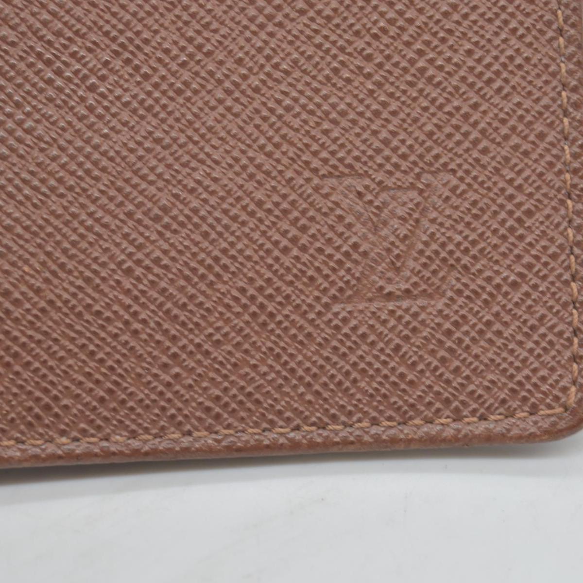 $435 Louis Vuitton Taiga ID Card Holder Wallet  SP0052