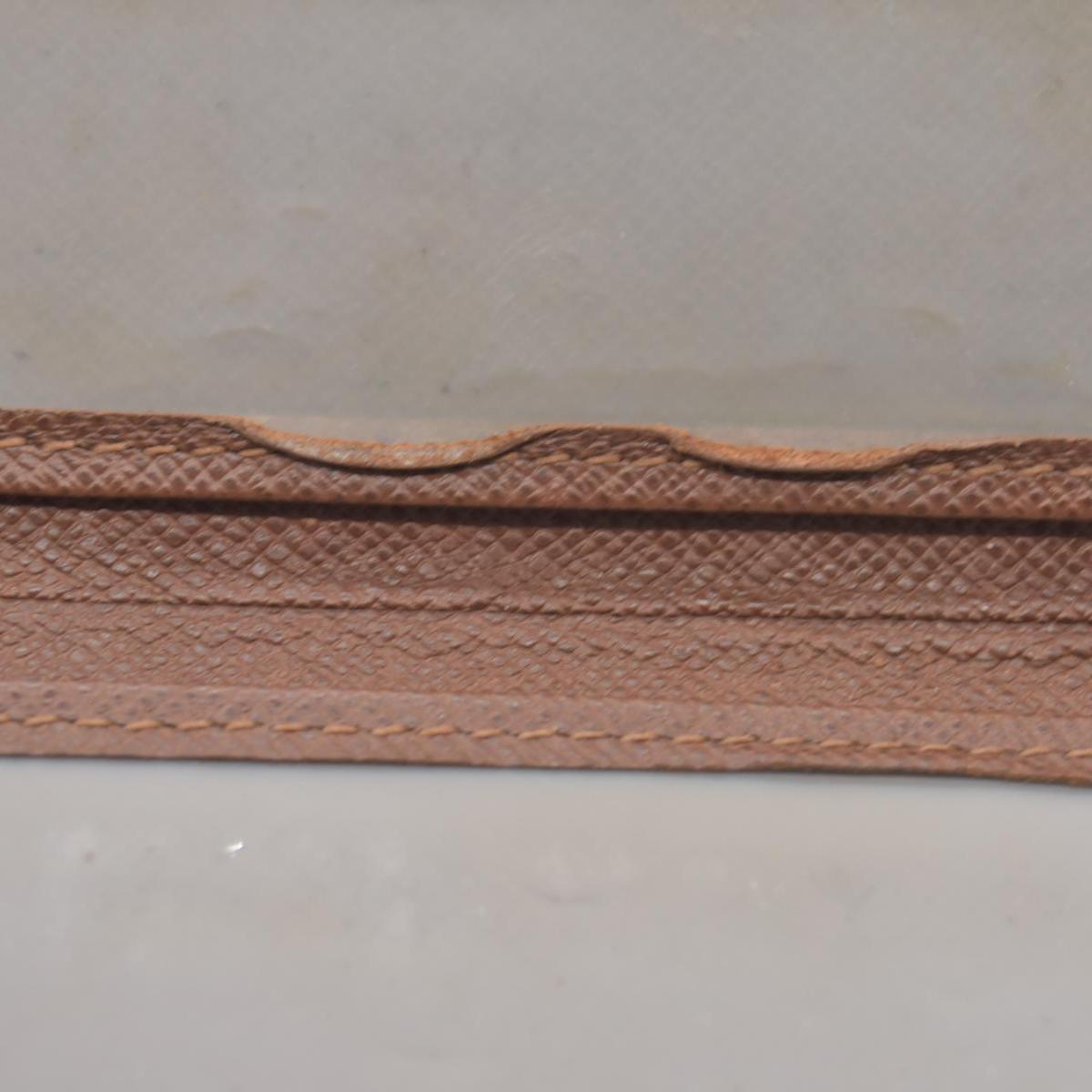 $435 Louis Vuitton Taiga ID Card Holder Wallet  SP0052