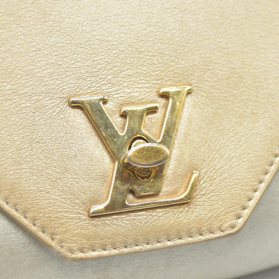 AUCTION $2150 Louis Vuitton  Metallic Calfskin Love Note Gold Bronze