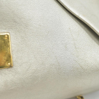 AUCTION $2150 Louis Vuitton  Metallic Calfskin Love Note Gold Bronze