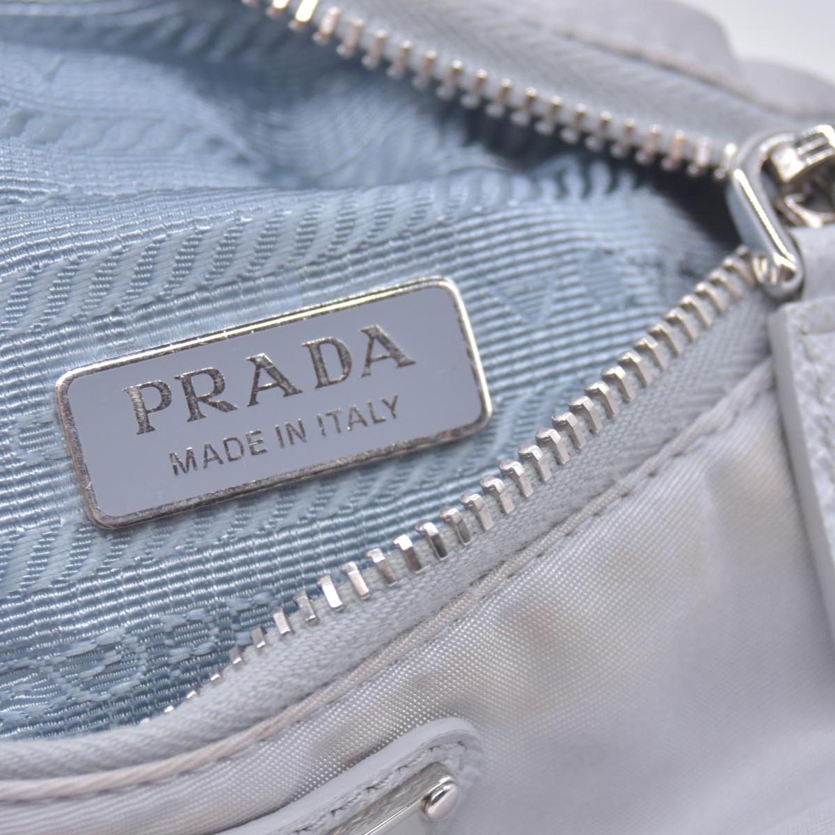 $925 Prada Triangle Plate Wrist Pouch Silver