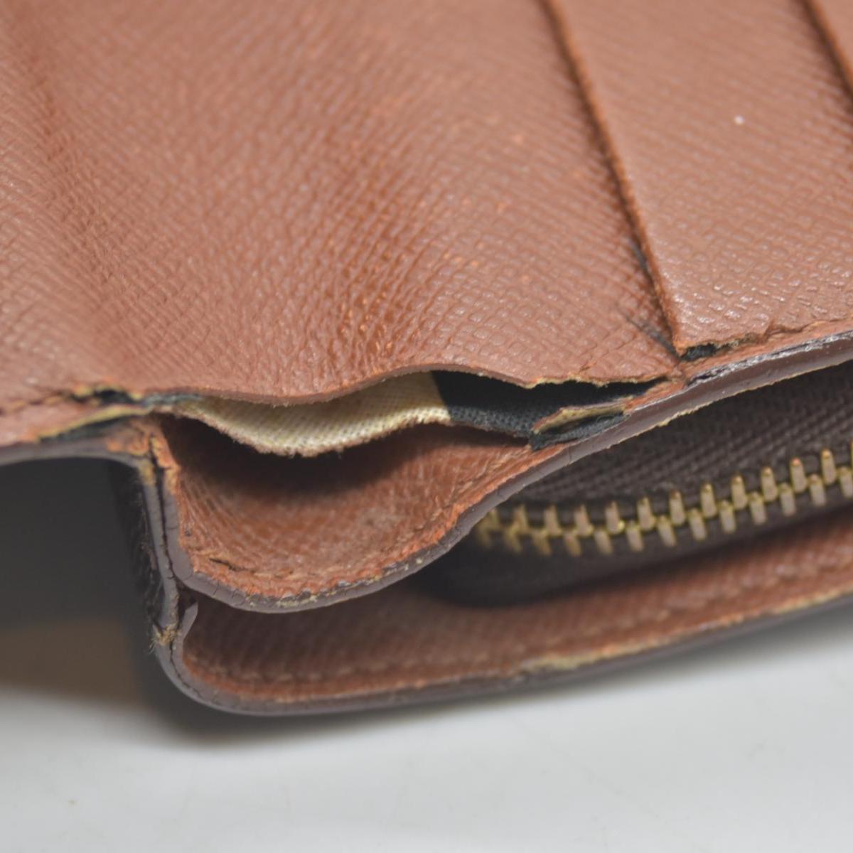 $750 Louis Vuitton Monogram Porte Papier Zippe Bifold Wallet Brown SP0078