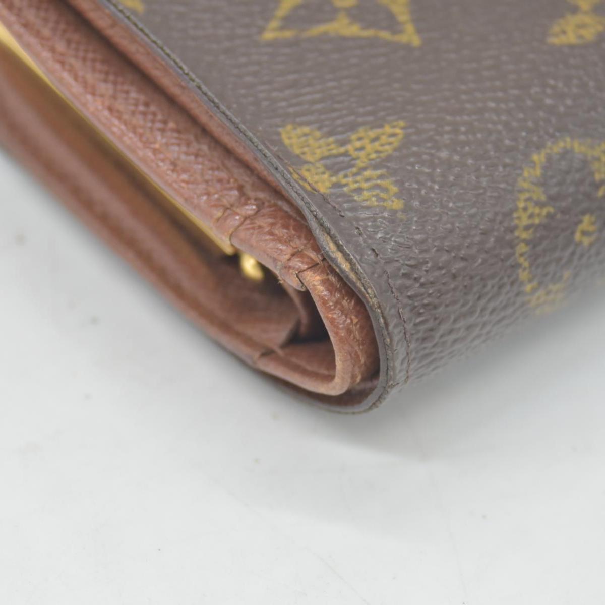 $750 Louis Vuitton Kisslock French Wallet MI0012