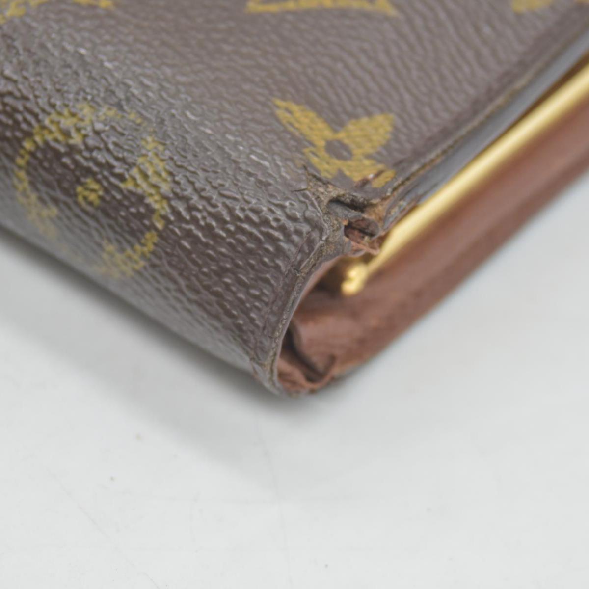 $750 Louis Vuitton Kisslock French Wallet MI0012