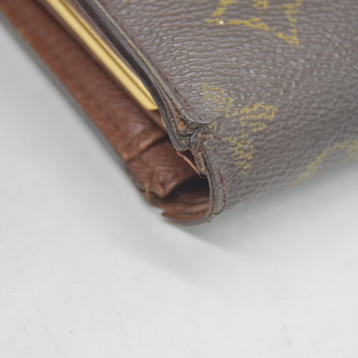 $750 Louis Vuitton Kisslock French Wallet MI0012