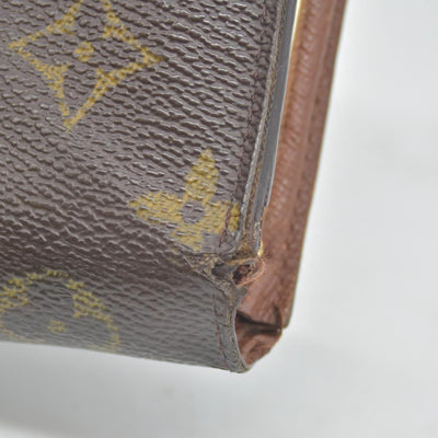 $750 Louis Vuitton Kisslock French Wallet MI0012