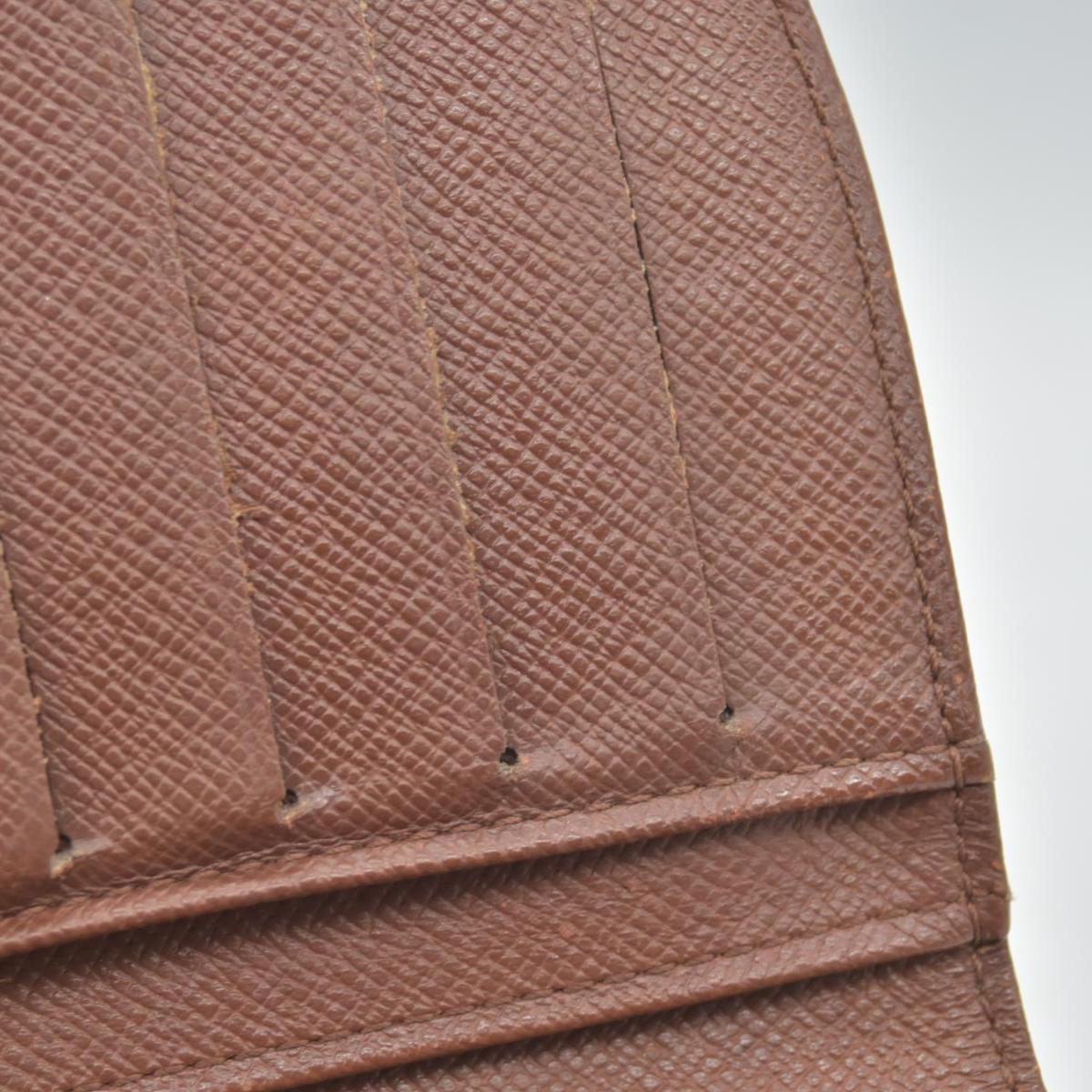 $750 Louis Vuitton Kisslock French Wallet MI0012