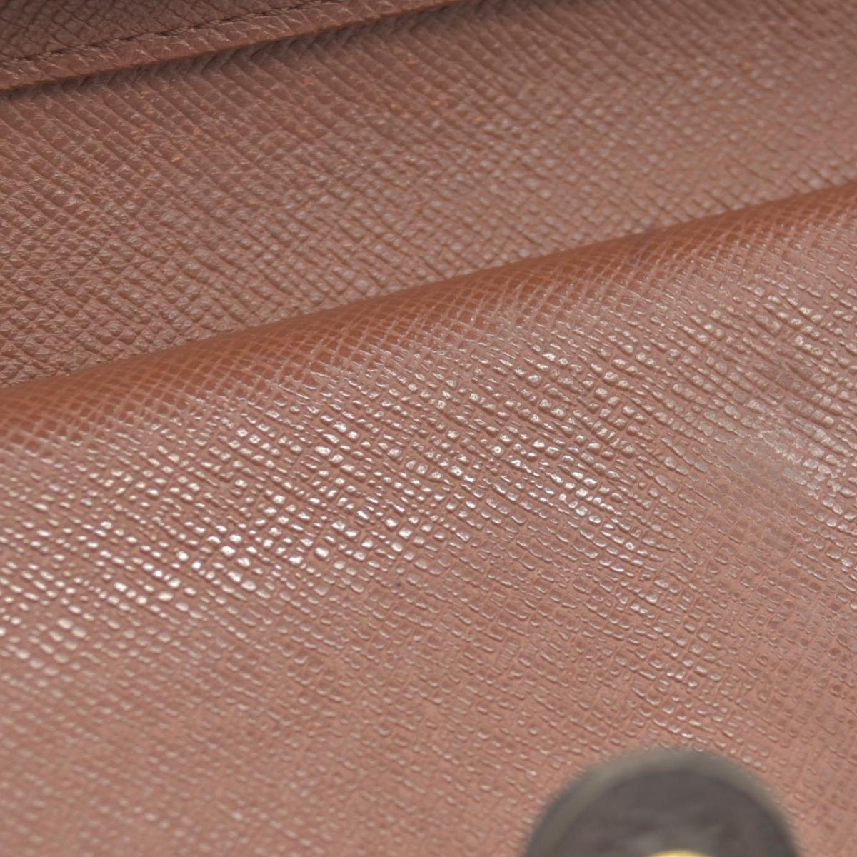 $750 Louis Vuitton Kisslock French Wallet MI0012