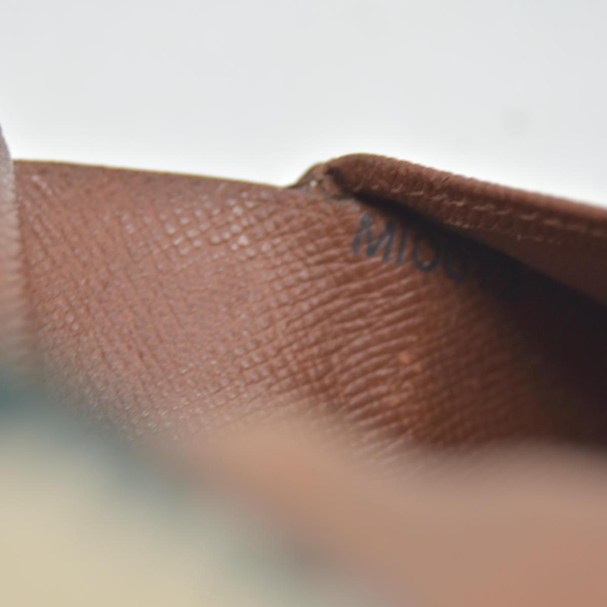 $750 Louis Vuitton Kisslock French Wallet MI0012