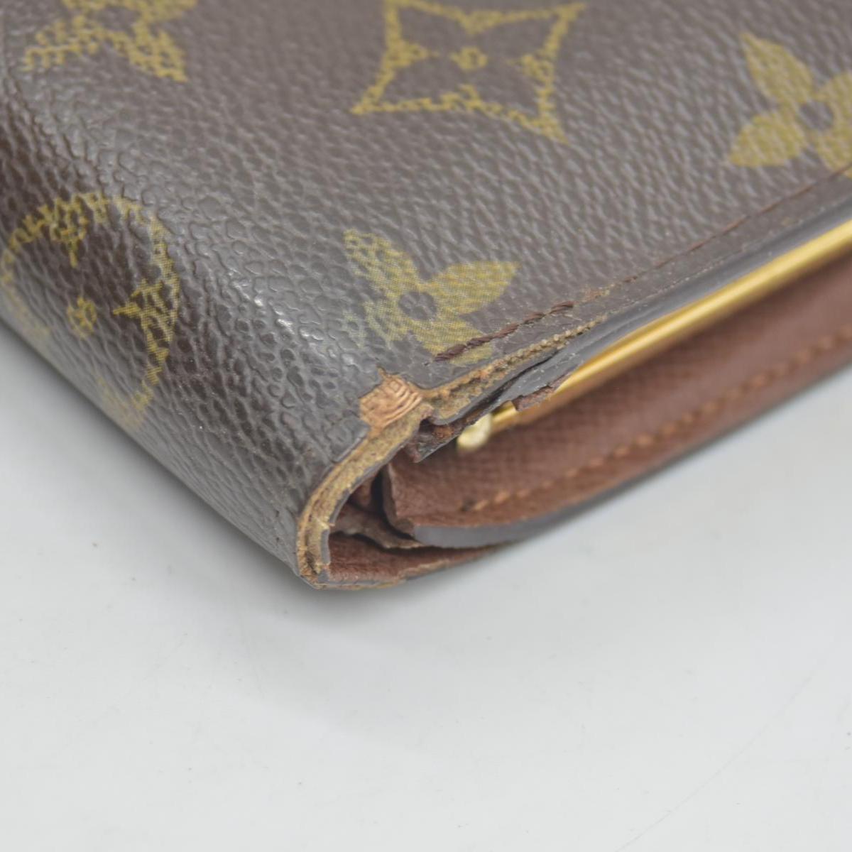$750 Louis Vuitton Kisslock French Wallet MI0013