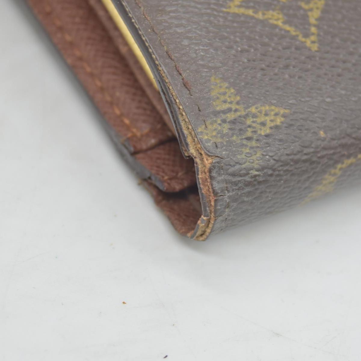 $750 Louis Vuitton Kisslock French Wallet MI0013