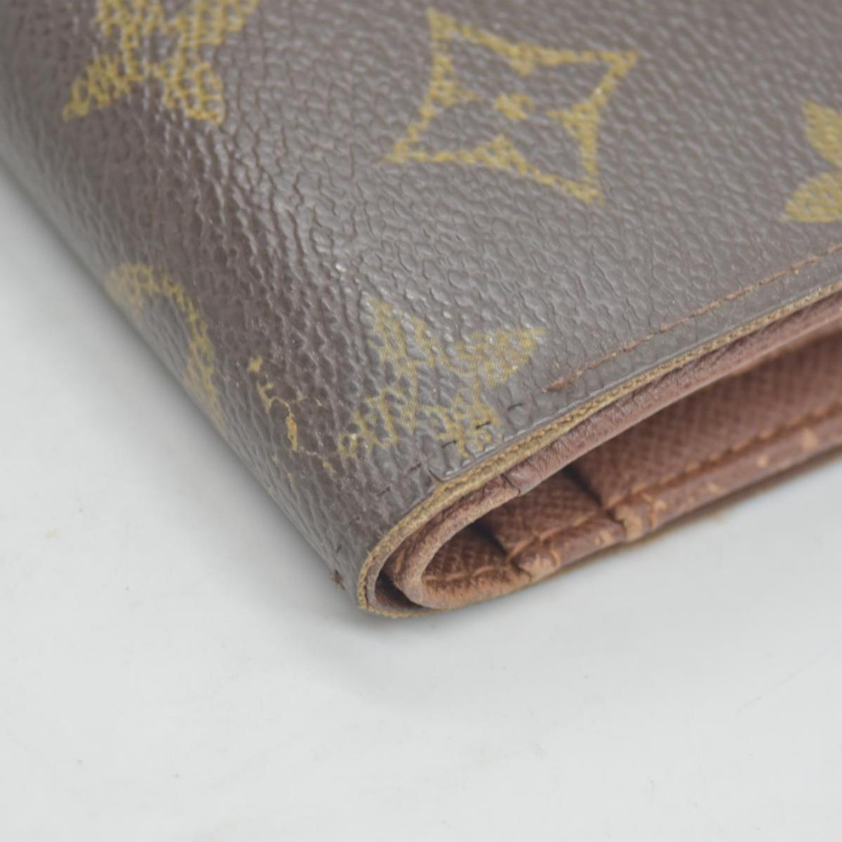 $750 Louis Vuitton Kisslock French Wallet CA0015