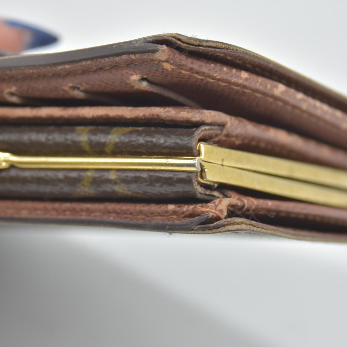$750 Louis Vuitton Kisslock French Wallet CA0015