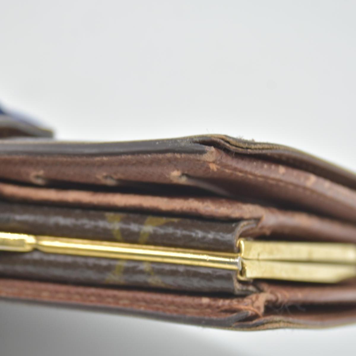 $750 Louis Vuitton Kisslock French Wallet MI0013