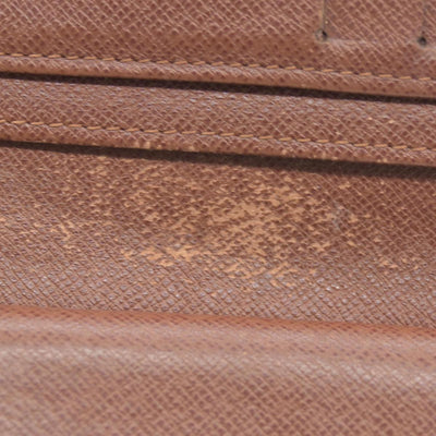 $750 Louis Vuitton Kisslock French Wallet CA0015