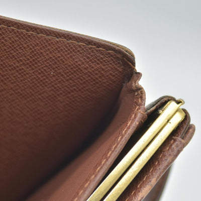 $750 Louis Vuitton Kisslock French Wallet CA0015