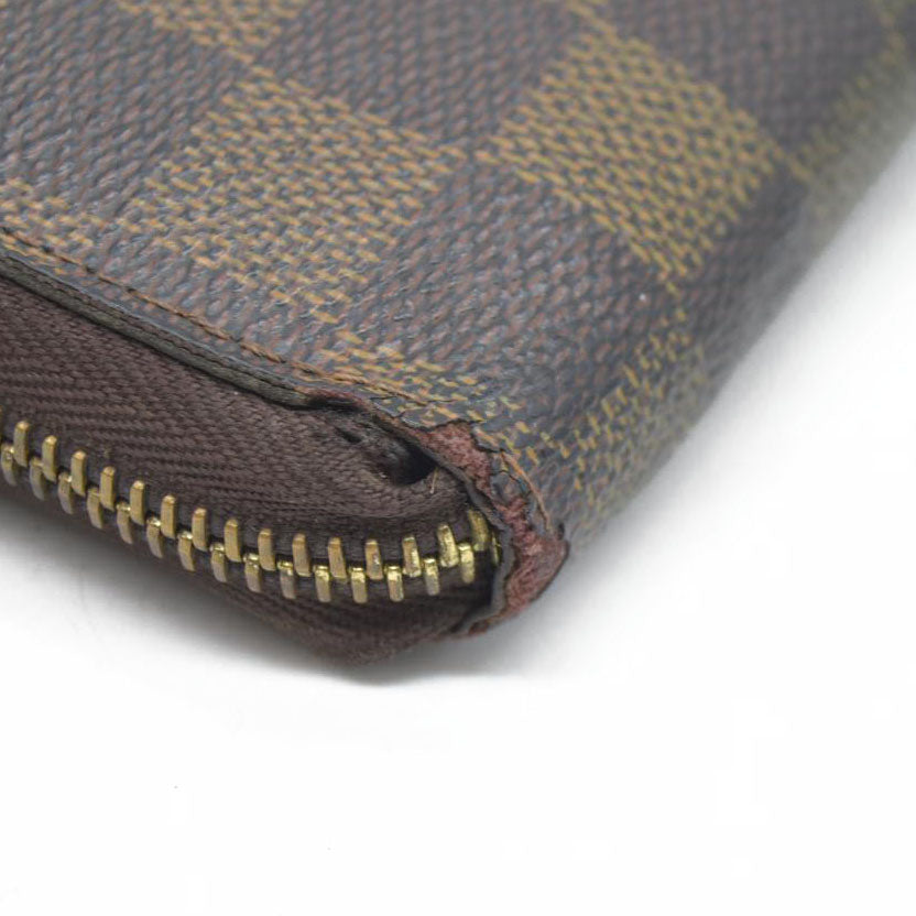 AUCTION $915 Louis Vuitton Damier Ebene Zippy Wallet