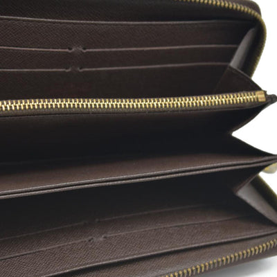 AUCTION $915 Louis Vuitton Damier Ebene Zippy Wallet